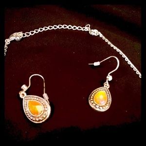 Matching earrings and necklace.